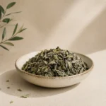 Premium Baladi Thyme Leaves 250g displayed in an aged white ceramic bowl, featuring authentic dried thyme leaves with natural texture and traditional Levantine character, photographed against a warm neutral DARLEVANT background with soft natural daylight.