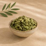 Premium Large Green Cardamom Pods 200g in a handcrafted ceramic bowl
