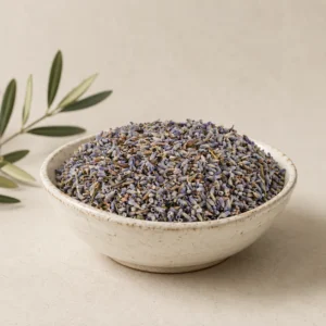 Premium Lavender Flowers in a handcrafted white ceramic bowl with natural dried lavender buds, warm neutral background, soft daylight, minimal botanical styling and elegant pantry presentation.