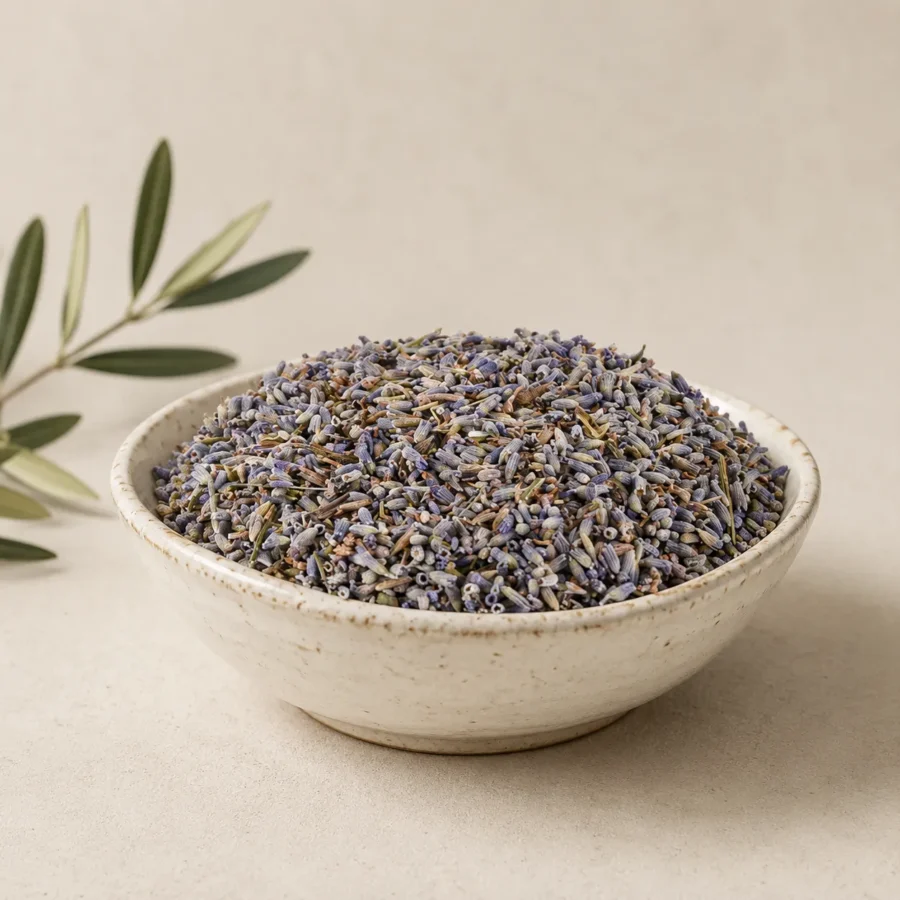 Premium Lavender Flowers in a handcrafted white ceramic bowl with natural dried lavender buds, warm neutral background, soft daylight, minimal botanical styling and elegant pantry presentation.