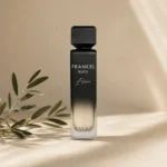 Assaf Frankel Black Elixir EDP for Men 200ml bottle on warm neutral background with ceramic styling and natural daylight