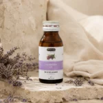 Hemani Lavender Oil 30ml presented in a botanical self-care ritual scene with dried lavender flowers, natural stone textures, linen accents, and a calm heritage-inspired atmosphere.