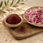 Authentic Jordanian sumac served with sliced red onions in a traditional Levant-inspired setting