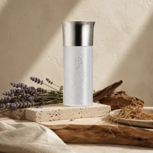 Heart Notes Image: Assaf Aura Eau de Parfum for Men 150ml with fresh lavender, cedarwood, and vetiver roots on layered travertine, limestone, and olive wood textures.