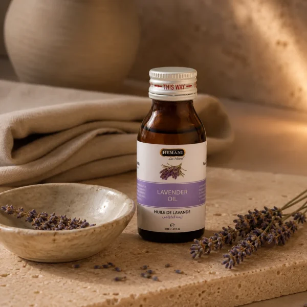 Hemani Lavender Oil 30ml presented in a botanical self-care ritual scene with dried lavender flowers, natural stone textures, linen accents, and a calm heritage-inspired atmosphere.