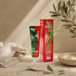 Levantine Ritual Image: Vesca New Forte cream 40g with soft green botanical accents and off-white cotton cloth on a natural travertine surface inspired by Levantine beauty rituals.
