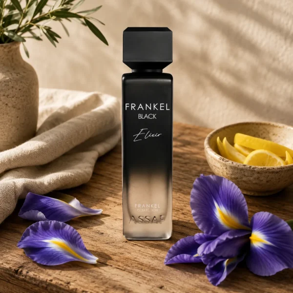 Assaf Frankel Black Elixir EDP for Men 200ml beside lemon slices and iris flowers on natural stone with warm daylight