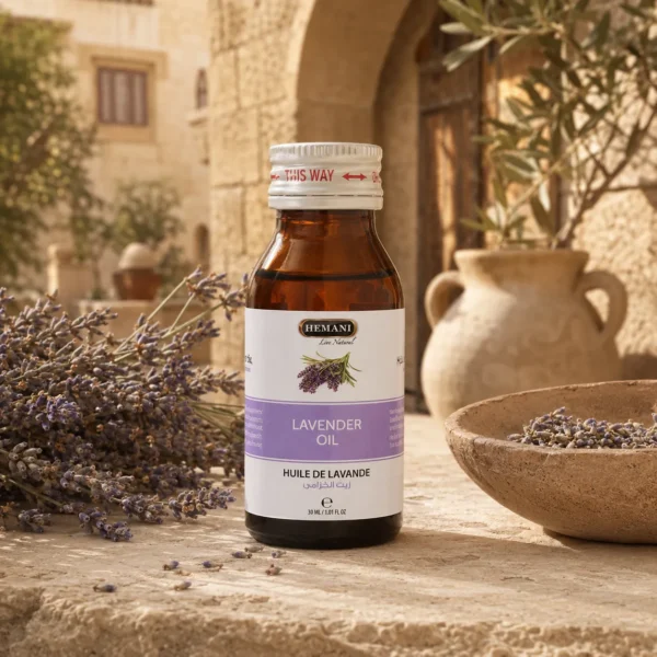 Hemani Lavender Oil 30ml showcased in a Levantine heritage-inspired botanical setting with rustic limestone textures, traditional courtyard details, dried lavender accents, and warm golden daylight.