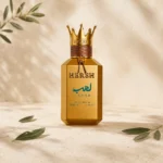 Hersh Lahab by Al Ezz Oud Eau de Parfum displayed on natural limestone with olive leaves in a refined Mediterranean luxury setting