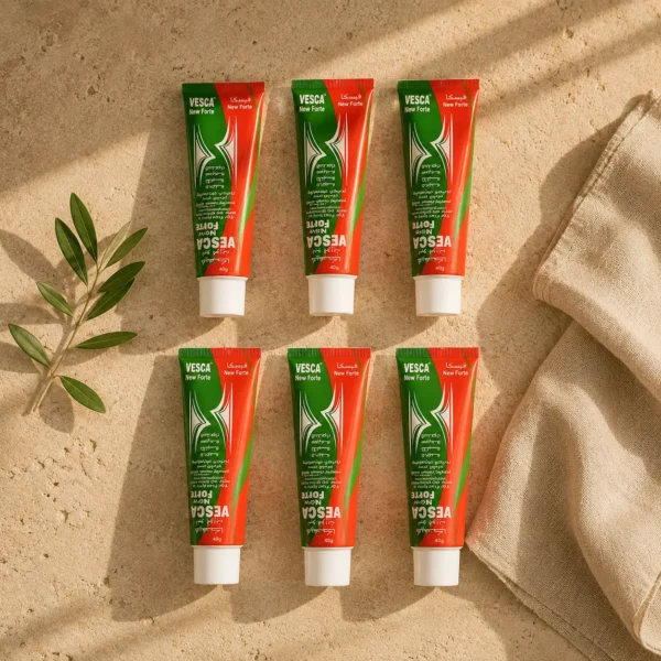VESCA New Forte Cream 6 Pack Bundle luxury flat lay on natural limestone with folded linen and olive branch by DARLEVANT